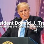 2024-10-10-THUMBNAIL-DJT-Addresses-Detroit-Economic-Club-585x329