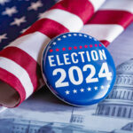 Vote election badge button with text Election 2024 background, lying at the American flag , vote USA 2024, 3D illustration.