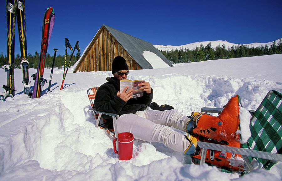 a-man-relaxing-in-the-snow-corey-rich